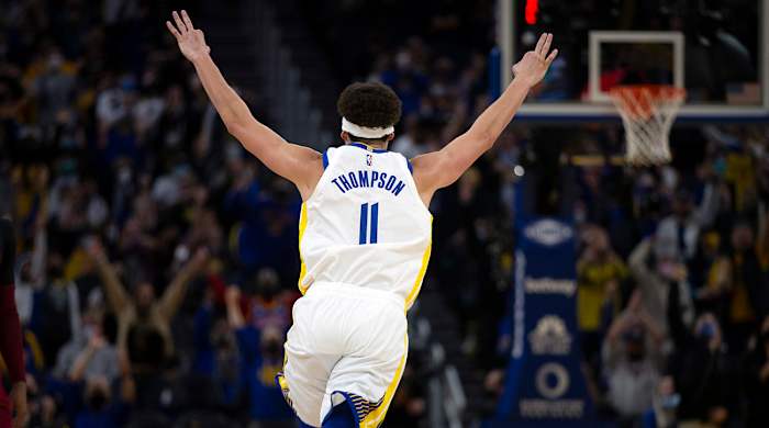 Golden State Warriors guard Klay Thompson (11) celebrates his 1800th career three-point basket